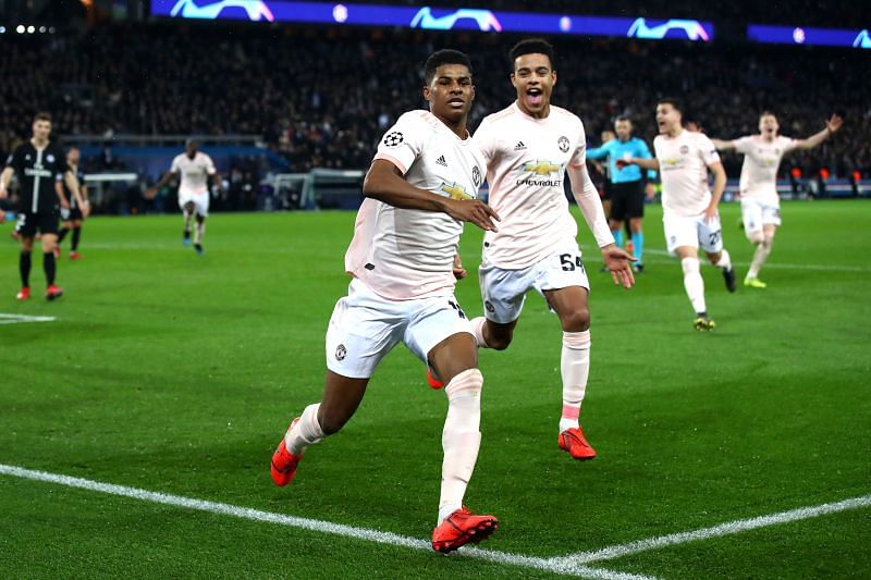 Rashford celebrates after scoring United's winner in stoppage time in last year's Round of 16 tie against PSG